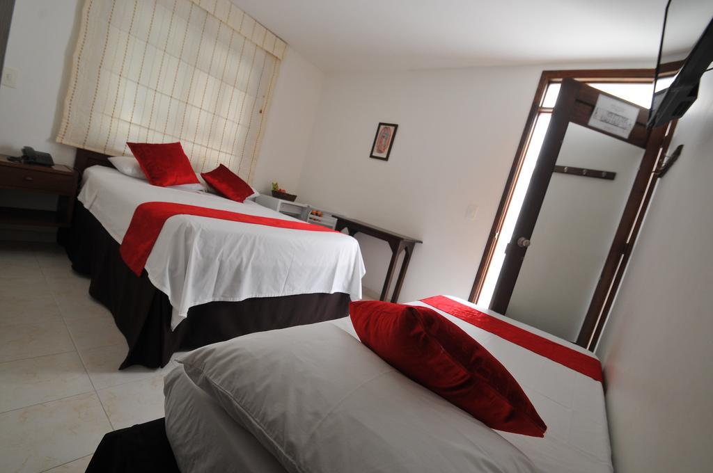 Hotel San Julian Буга Номер фото